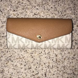 Micheal Kors beige and brown wallet